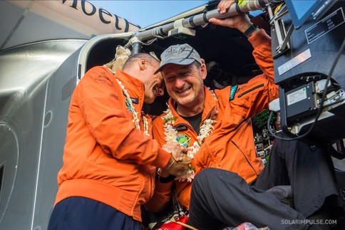 Jubilant Swiss explorers Andre Borschberg (right) and Bertrand Piccard after landing the Solar Impulse in Kalaeloa, Hawaii after five days and nights of non-stop flight. Image: Solarimpulse.com